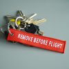 Fostex - Brelok do kluczy Remove Before Flight - Czerwony
